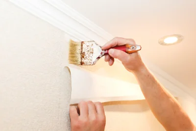 Pose de papier peint à Holque — revêtements muraux et toiles de verre